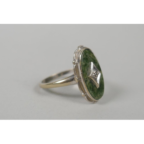 625 - A 10ct white gold and green jade panel ring set with a diamond, size M, a 10ct gold and emerald set ... 