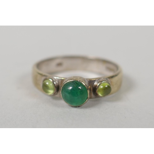 625 - A 10ct white gold and green jade panel ring set with a diamond, size M, a 10ct gold and emerald set ... 