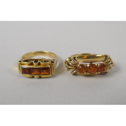 627 - A 14ct  gold and three stone citrine set dress ring, size M, 5.5g gross, and a similar 14ct rin... 