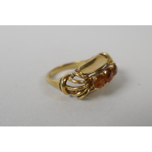 627 - A 14ct  gold and three stone citrine set dress ring, size M, 5.5g gross, and a similar 14ct rin... 