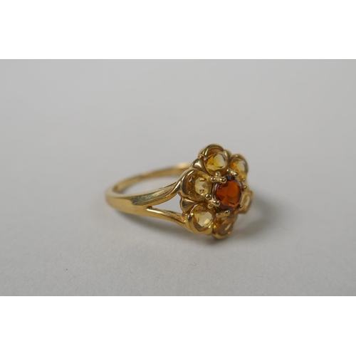 631 - Three 9ct gold dress rings set with garnets and citrines, sizes P, P and M, 7.3g gross, and a vintag... 