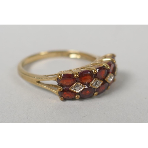 631 - Three 9ct gold dress rings set with garnets and citrines, sizes P, P and M, 7.3g gross, and a vintag... 