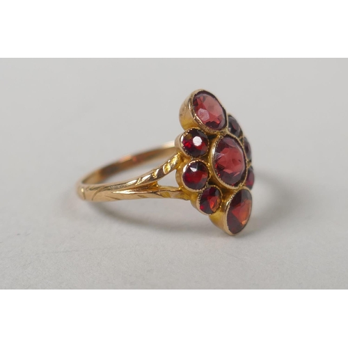 631 - Three 9ct gold dress rings set with garnets and citrines, sizes P, P and M, 7.3g gross, and a vintag... 