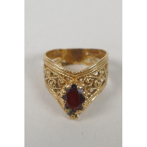 632 - Two vintage 10ct gold and garnet set dress rings, size Q and P, 5.4g gross, a 9ct gold and garnet th... 