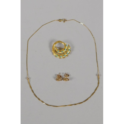 633 - An Italian 9ct gold necklace, 2.4g; a pair of 9ct gold stud earrings, 1.4g; and a yellow metal and t... 