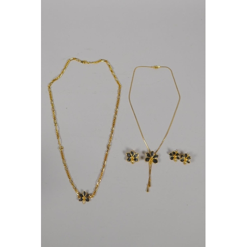 634 - A vintage set of Risis 24ct gold plated Orchid jewellery, to include two necklaces, a pair of earrin... 