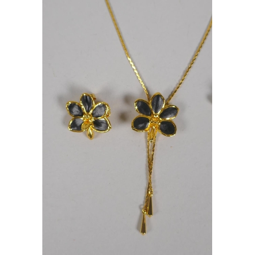 634 - A vintage set of Risis 24ct gold plated Orchid jewellery, to include two necklaces, a pair of earrin... 