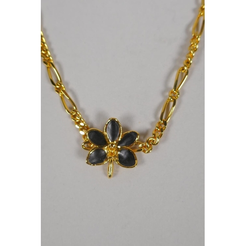 634 - A vintage set of Risis 24ct gold plated Orchid jewellery, to include two necklaces, a pair of earrin... 