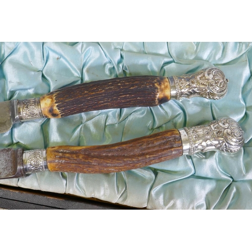 637 - A Victorian Sheffield silver plated carving set with antler horn handles, in velvet lined case, lack... 