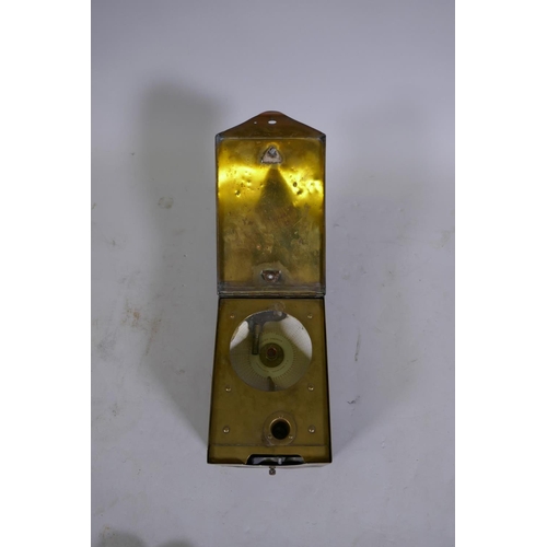 64 - A vintage pigeon racing clock in brass case, 20 x 14 x 13cm