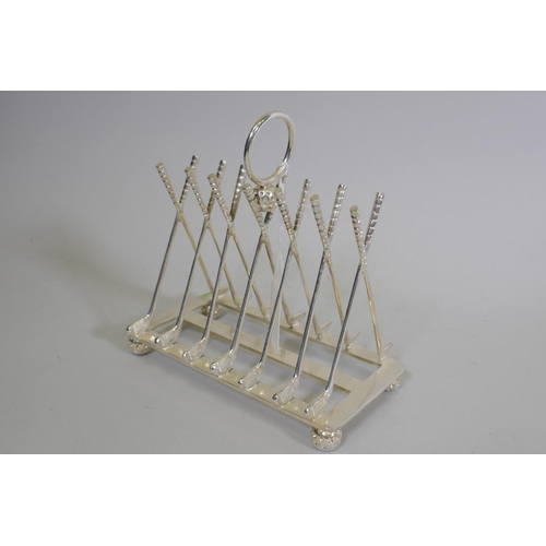 641 - A silver plated letter/toast rack in the form of leaning golf clubs, 16 x 9 x 16cm