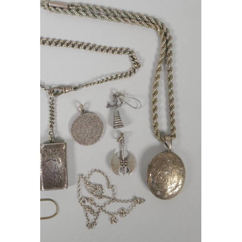 645 - A quantity of silver costume jewellery to include pendants, earrings, lockets, chains, charm bracele... 