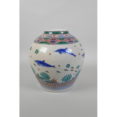 67 - A C19th Chinese famille verte porcelain vase decorated with dolphins, mark to base, 20cm high