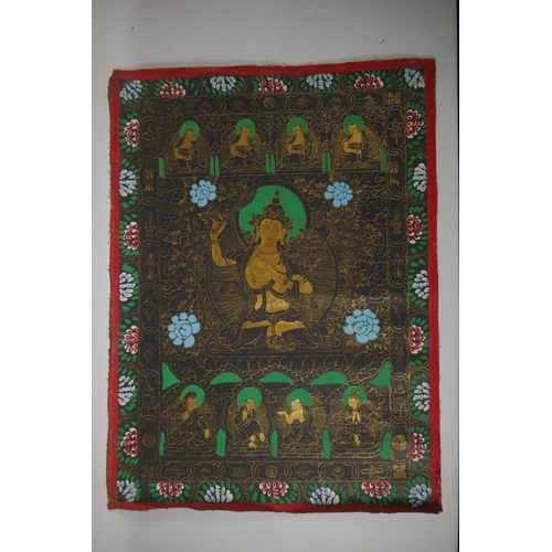 70 - A Tibetan hand painted thangka depicting Tara, 48 x 65cm