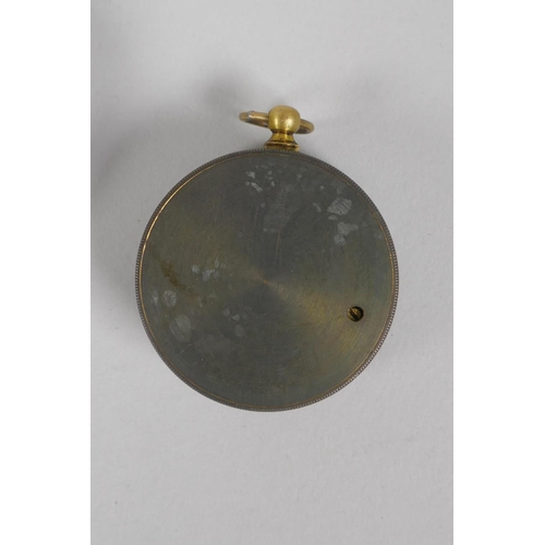 74 - An antique brass cased compensated pocket barometer in a leather case, 5cm diameter