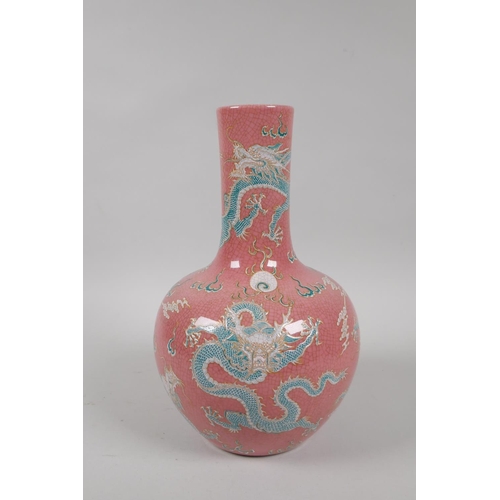 75 - A Chinese pink crackle glazed porcelain vase decorated with green and white enamel dragons, KangXi 6... 