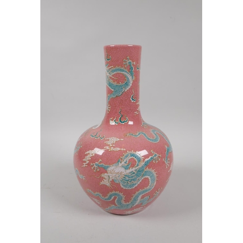 75 - A Chinese pink crackle glazed porcelain vase decorated with green and white enamel dragons, KangXi 6... 