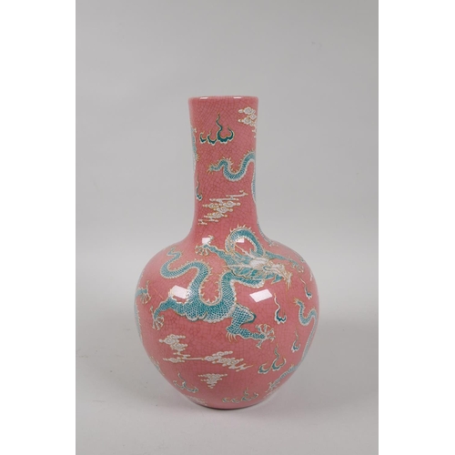 75 - A Chinese pink crackle glazed porcelain vase decorated with green and white enamel dragons, KangXi 6... 