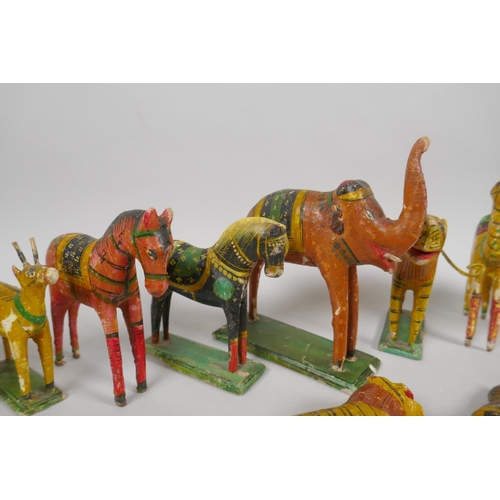 78 - A collection of Indian Nirmal carved and painted wooden figures of indigenous animals, some AF, larg... 