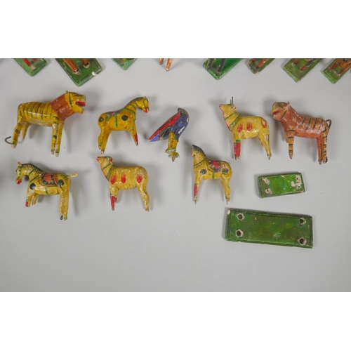 78 - A collection of Indian Nirmal carved and painted wooden figures of indigenous animals, some AF, larg... 