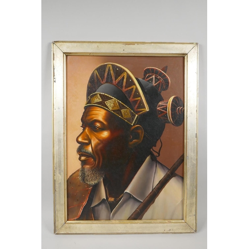 828 - Portrait of an African gentleman in a tribal headdress, oil on board, 33 x 45cm