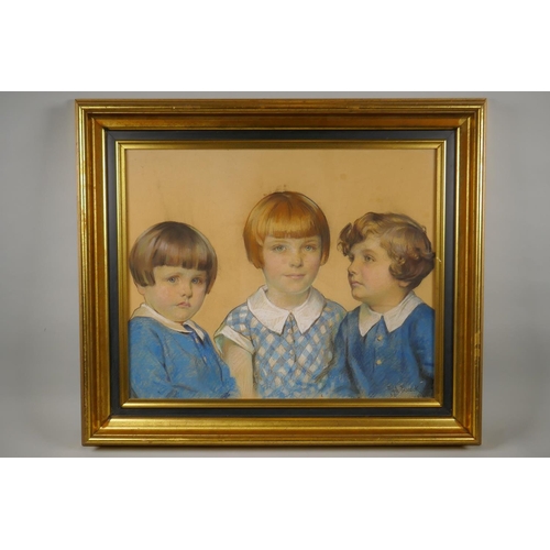 844 - Portrait of three children, signed Ralph Peacock, (British, 1868-1946), pastel, 54 x 44cm