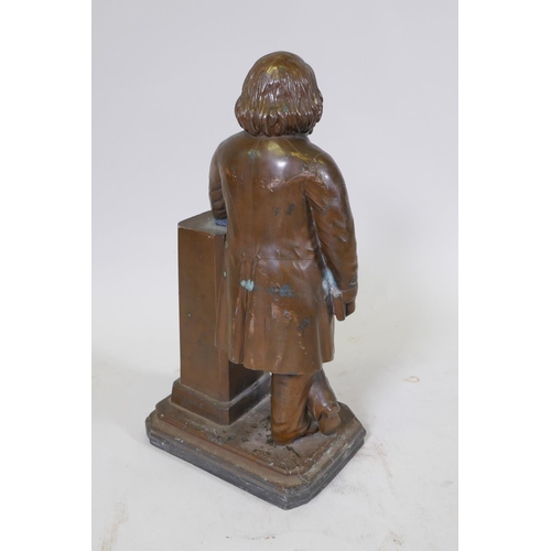 9 - William R. Brodie, (Scottish), bronze figure of a Victorian gentleman leaning against a plinth holdi... 