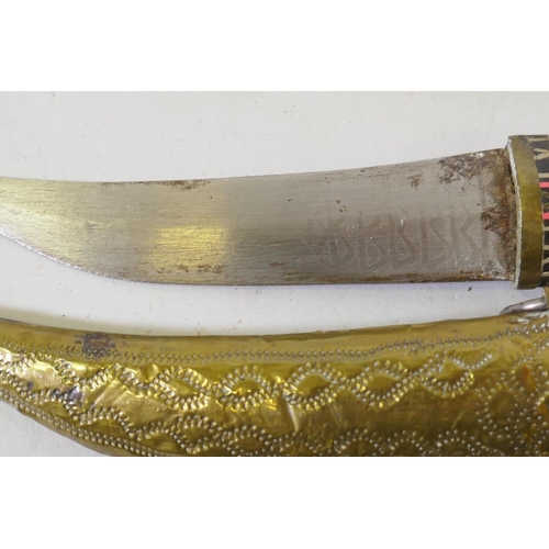 94 - An Eritrean curved metal dagger with horn handle, the sheath engraved 9-5-47 Asmara, 29cm long; an A... 