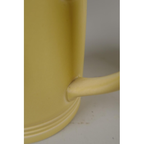 98 - Keith Murray for Wedgwood, yellow glazed matching jug and mug, 21cm high