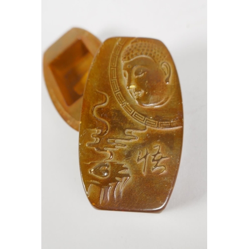 99 - A Chinese amber soapstone seal in a matching soapstone box, with carved Buddha decoration to cover, ... 