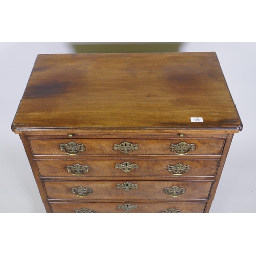 1007 - George III mahogany bachelor's chest, the moulded edge top with cut corners over a brushing slide an... 