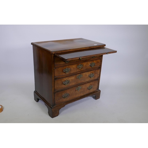 1007 - George III mahogany bachelor's chest, the moulded edge top with cut corners over a brushing slide an... 