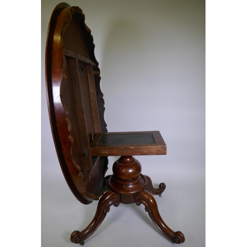 1009 - A good Victorian mahogany tilt top and swivel breakfast table, with shaped frieze raised on a turned... 