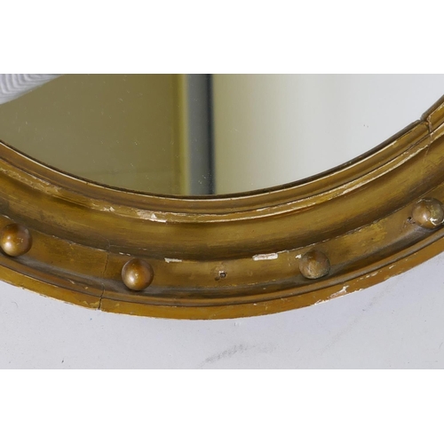 1014 - Early C19th giltwood circular wall mirror, with later flat mirror, 53cm diameter