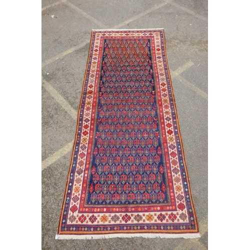 1023 - An antique Persian blue ground Malayer Farahan Kalleh rug, with hand spun wool and natural dyes, dec... 