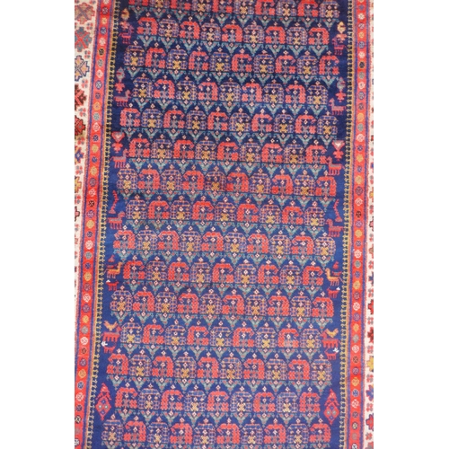 1023 - An antique Persian blue ground Malayer Farahan Kalleh rug, with hand spun wool and natural dyes, dec... 