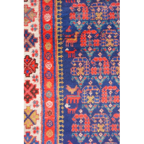 1023 - An antique Persian blue ground Malayer Farahan Kalleh rug, with hand spun wool and natural dyes, dec... 