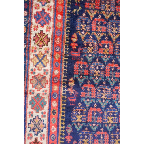 1023 - An antique Persian blue ground Malayer Farahan Kalleh rug, with hand spun wool and natural dyes, dec... 