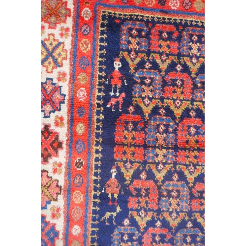 1023 - An antique Persian blue ground Malayer Farahan Kalleh rug, with hand spun wool and natural dyes, dec... 