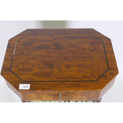 1025 - An early C19th figured mahogany work table, the top opening to reveal a lift out fitted tray over a ... 