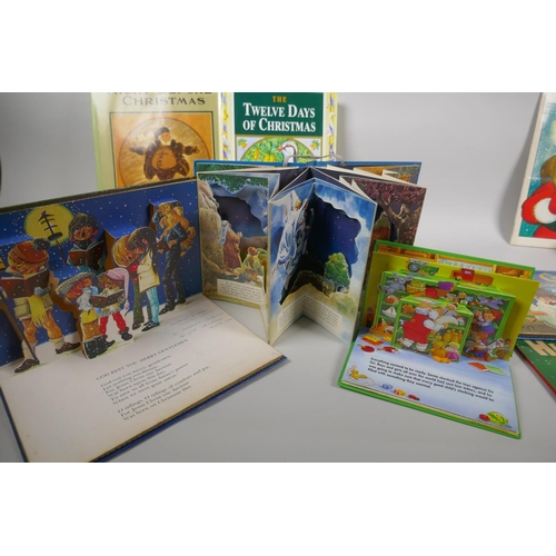 104 - A collection of vintage children's Christmas pop-up books and picture books including The Night Befo... 