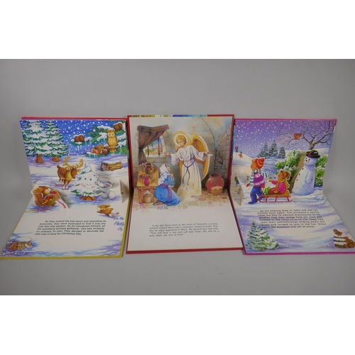 104 - A collection of vintage children's Christmas pop-up books and picture books including The Night Befo... 