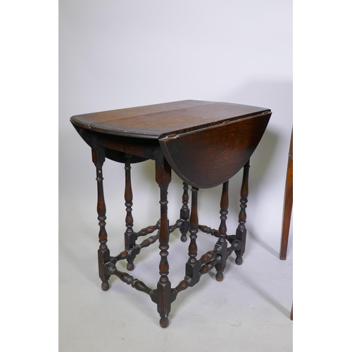 1054 - C19th mahogany bow front knee hole dressing/writing table with three drawers and brass handles, rais... 