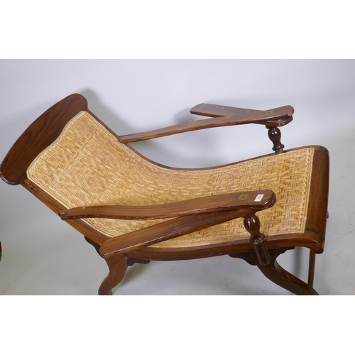 1055 - A rosewood and caned plantation day bed