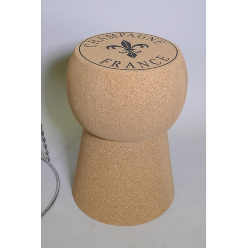 1059 - A pair of cork and metal stools in the form of champagne corks, 61cm high