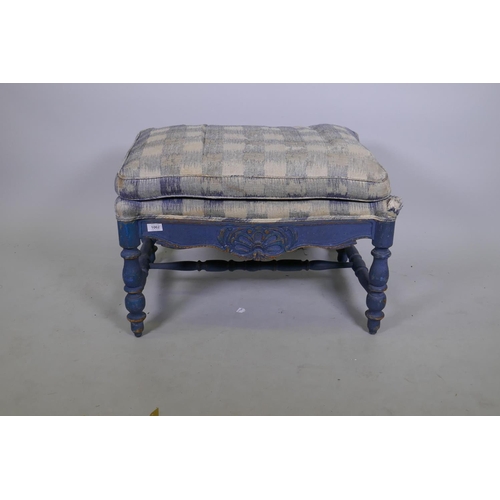 1062 - A painted French style serpentine shaped stool, with carved decoration, raised on turned supports, 7... 