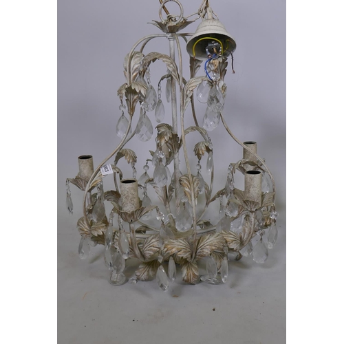 1063 - A pair of French style painted and parcel gilt metal five branch chandeliers with lustre drops, 54cm... 