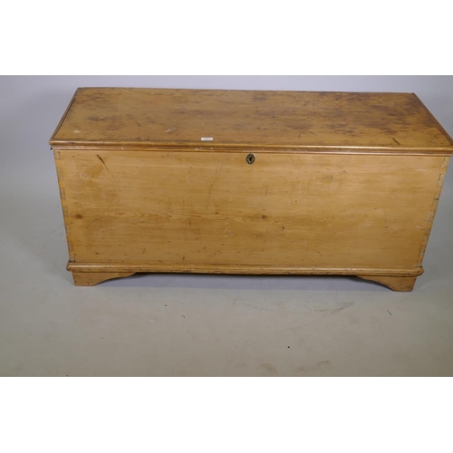 1071 - A C19th pine blanket chest, the lift up top with moulded edge, raised on bracket supports, 38 x 52 x... 