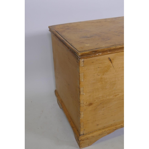 1071 - A C19th pine blanket chest, the lift up top with moulded edge, raised on bracket supports, 38 x 52 x... 