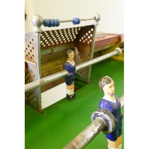 1072 - A 1950s/60s French Stella Champion table football game, original painted finish, metal players, fixe... 